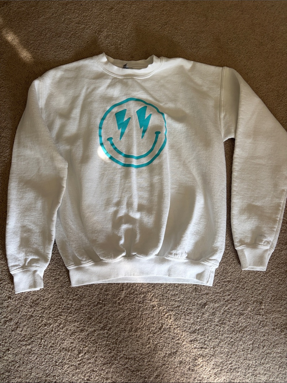 Gildan kids xl White Crewneck Sweatshirt with Teal Lightning Smile Graphic